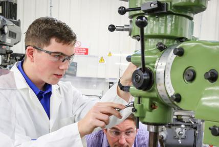 Engineering Student with Machine at Bournemouth & Poole college