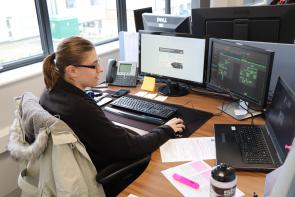 Apprentice working at her computer